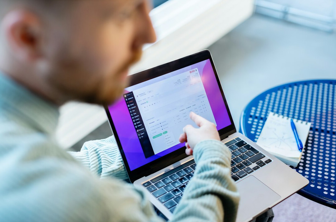person learning programming on laptop