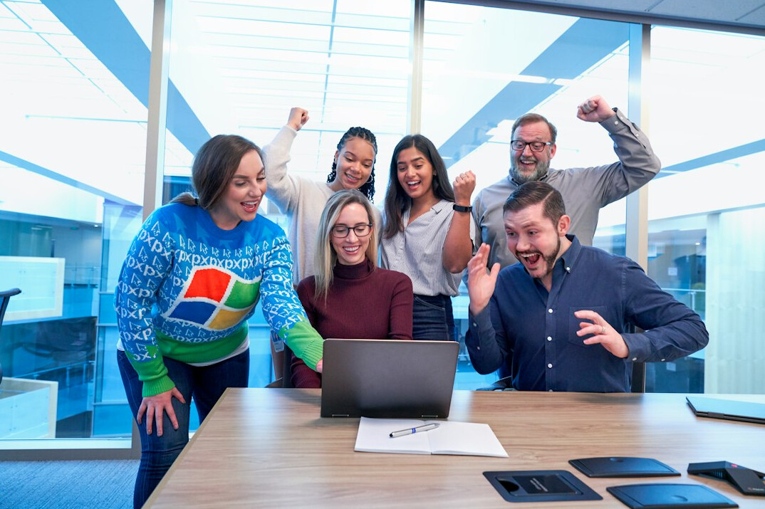 person celebrating coding success